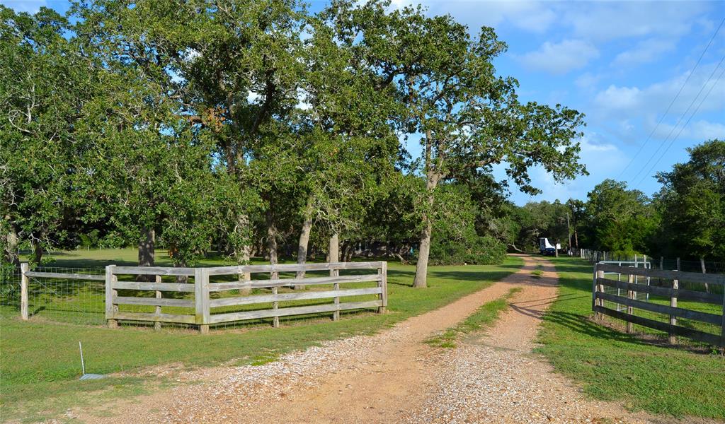 a view of a house with a big yard