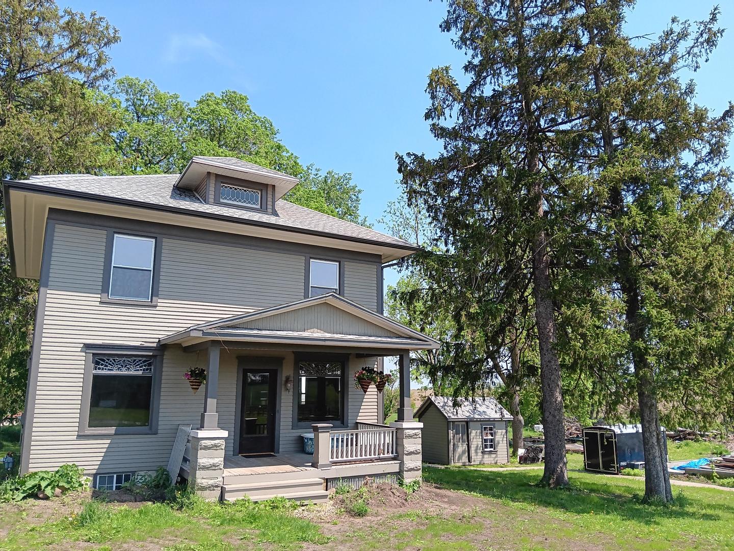 a view of a house with a yard