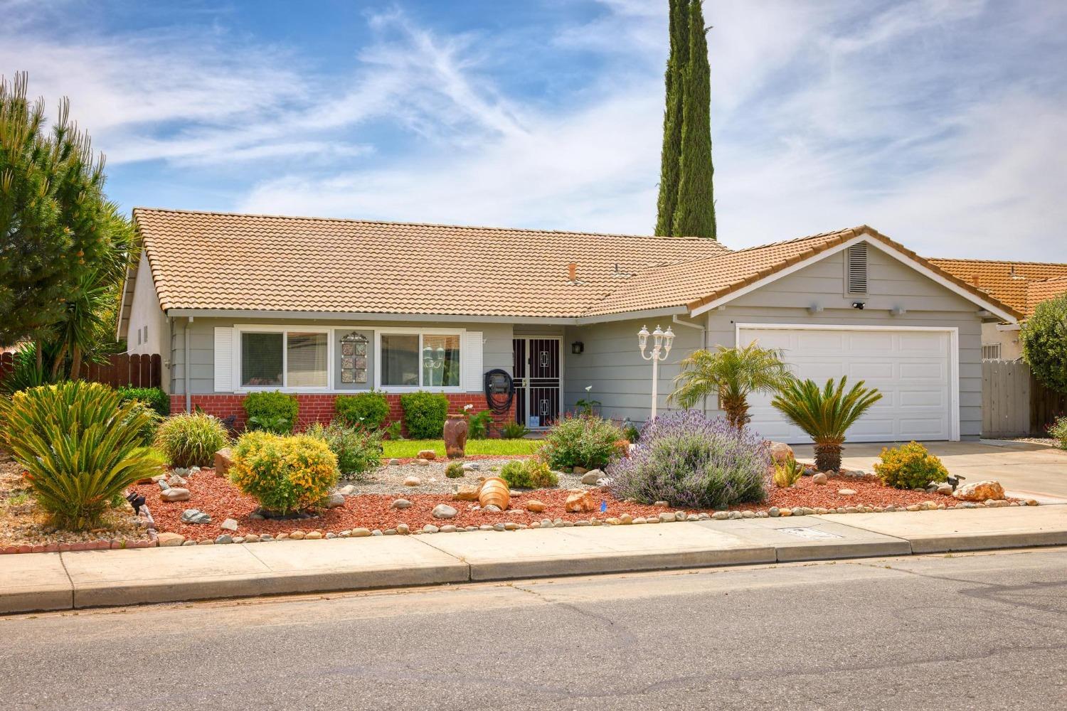 front view of a house with a small yard