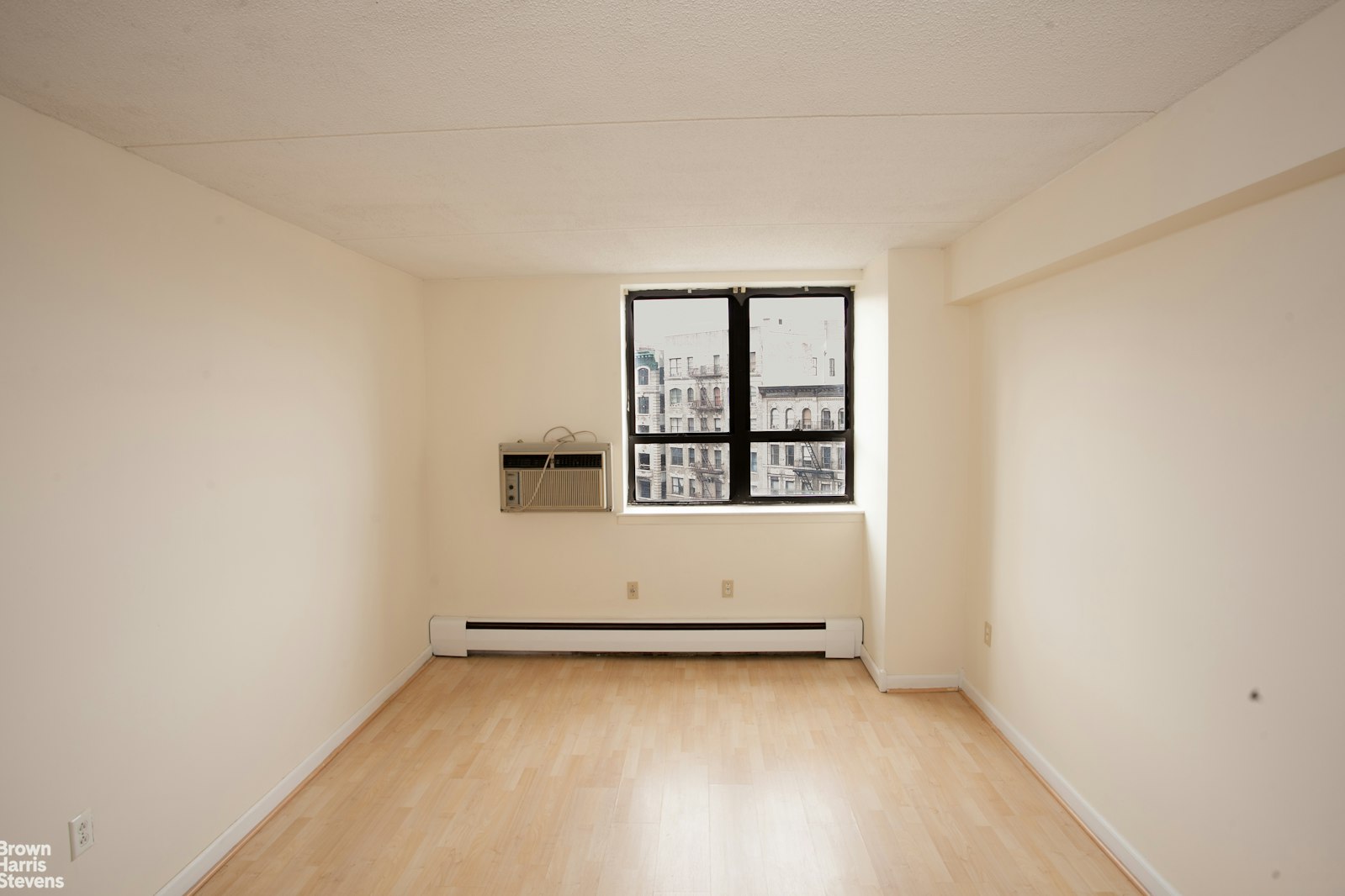 a view of an empty room with window