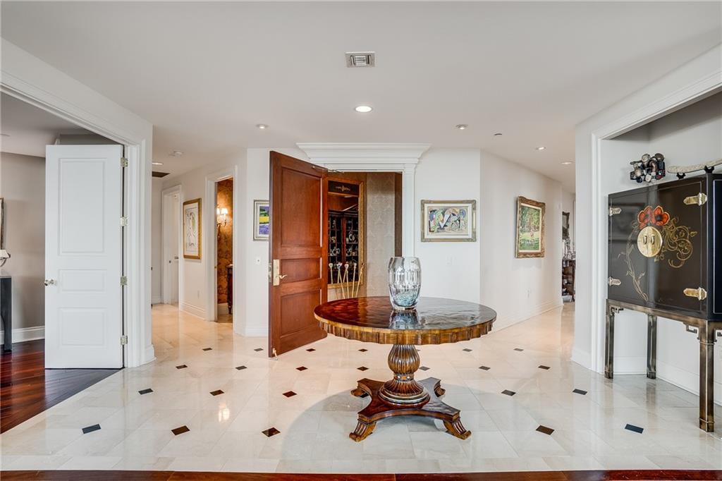 a view of a livingroom with furniture and front door