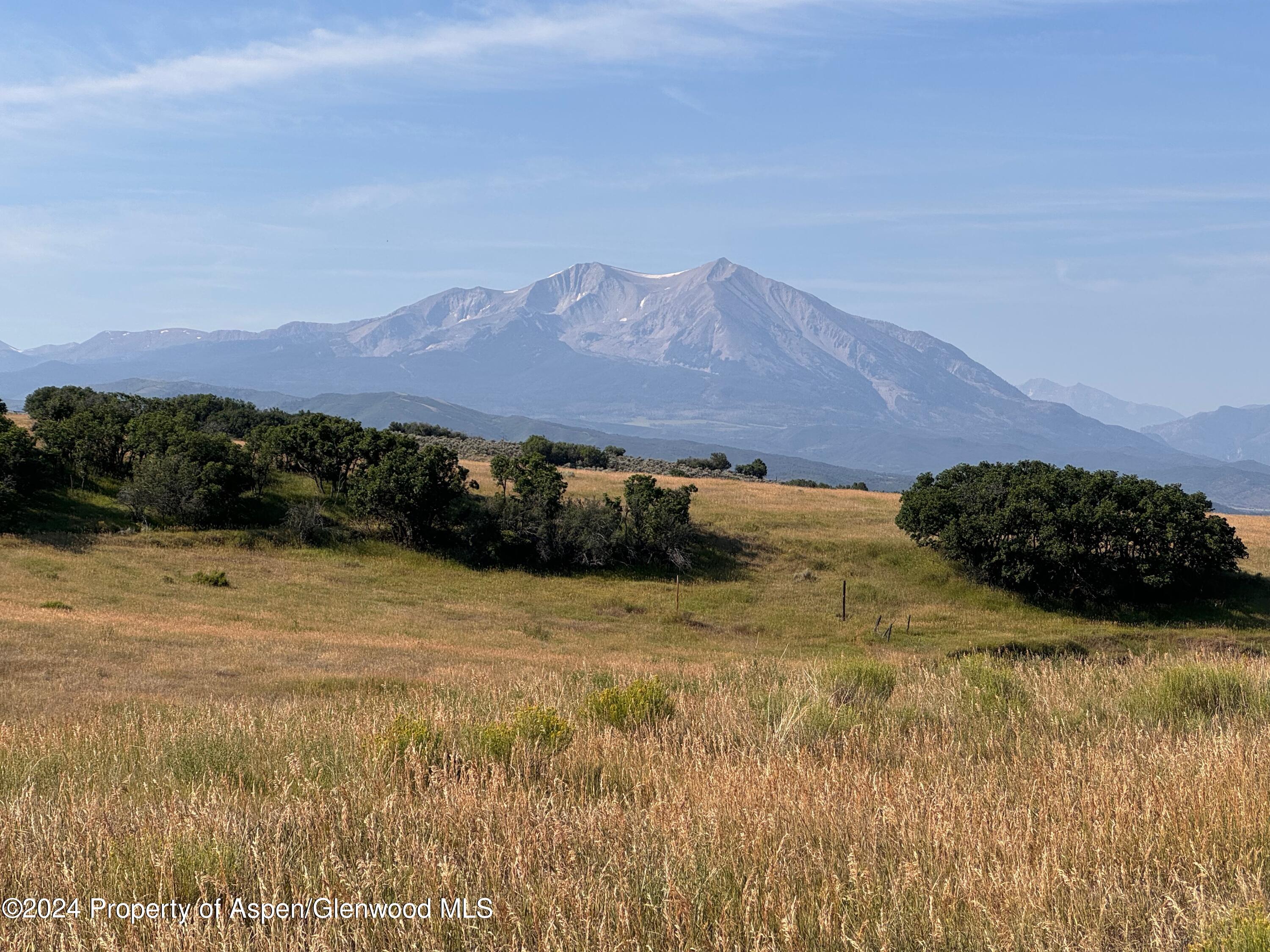 a view of an outdoor space and mountain view