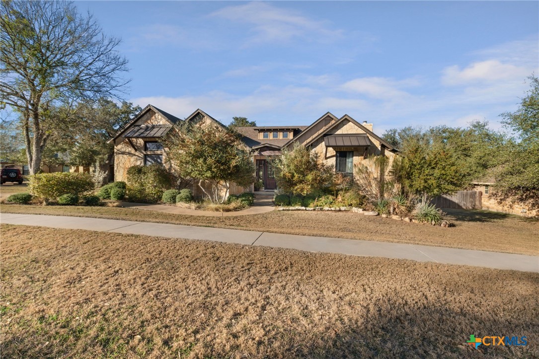 a view of large house with a road