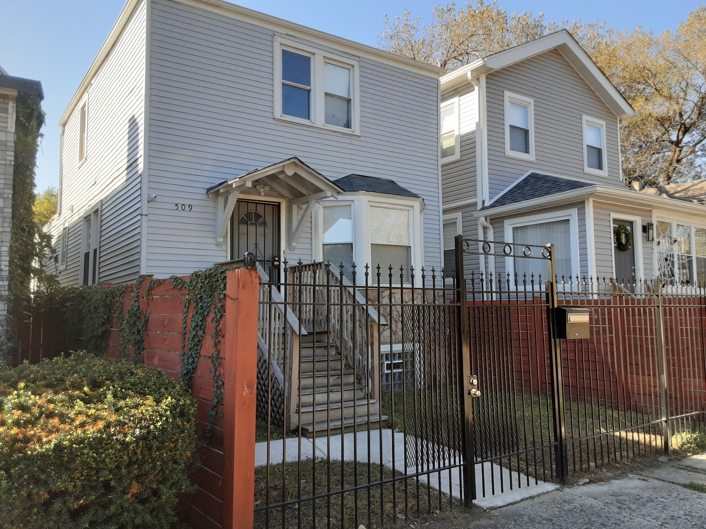 a front view of a house with parking space