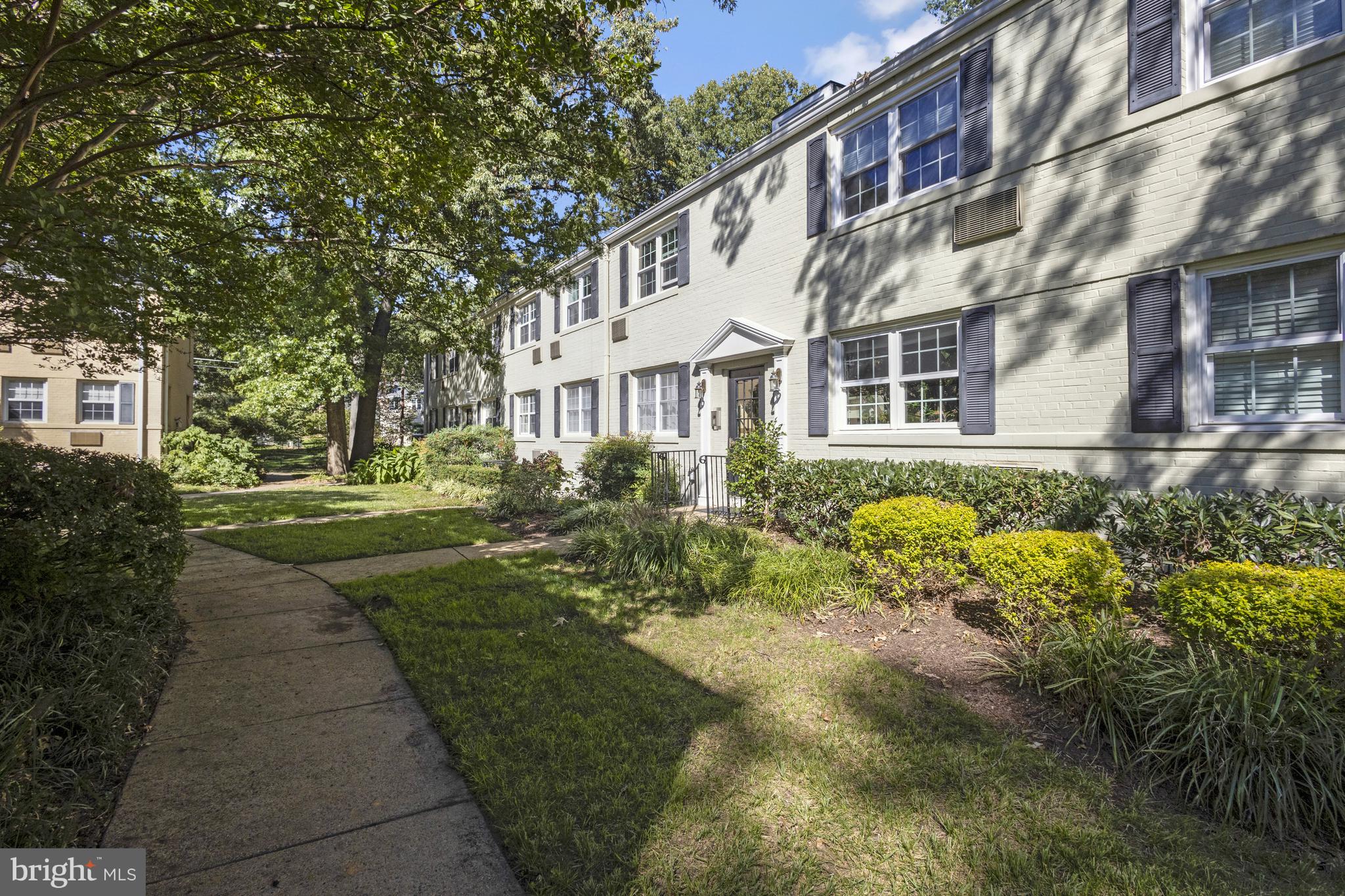 a view of a building with a garden