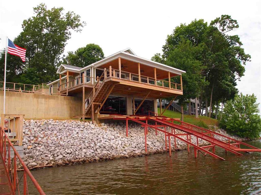 Exterior space featuring a deck with water view