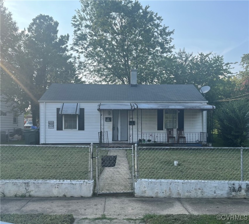 front view of a house with a yard