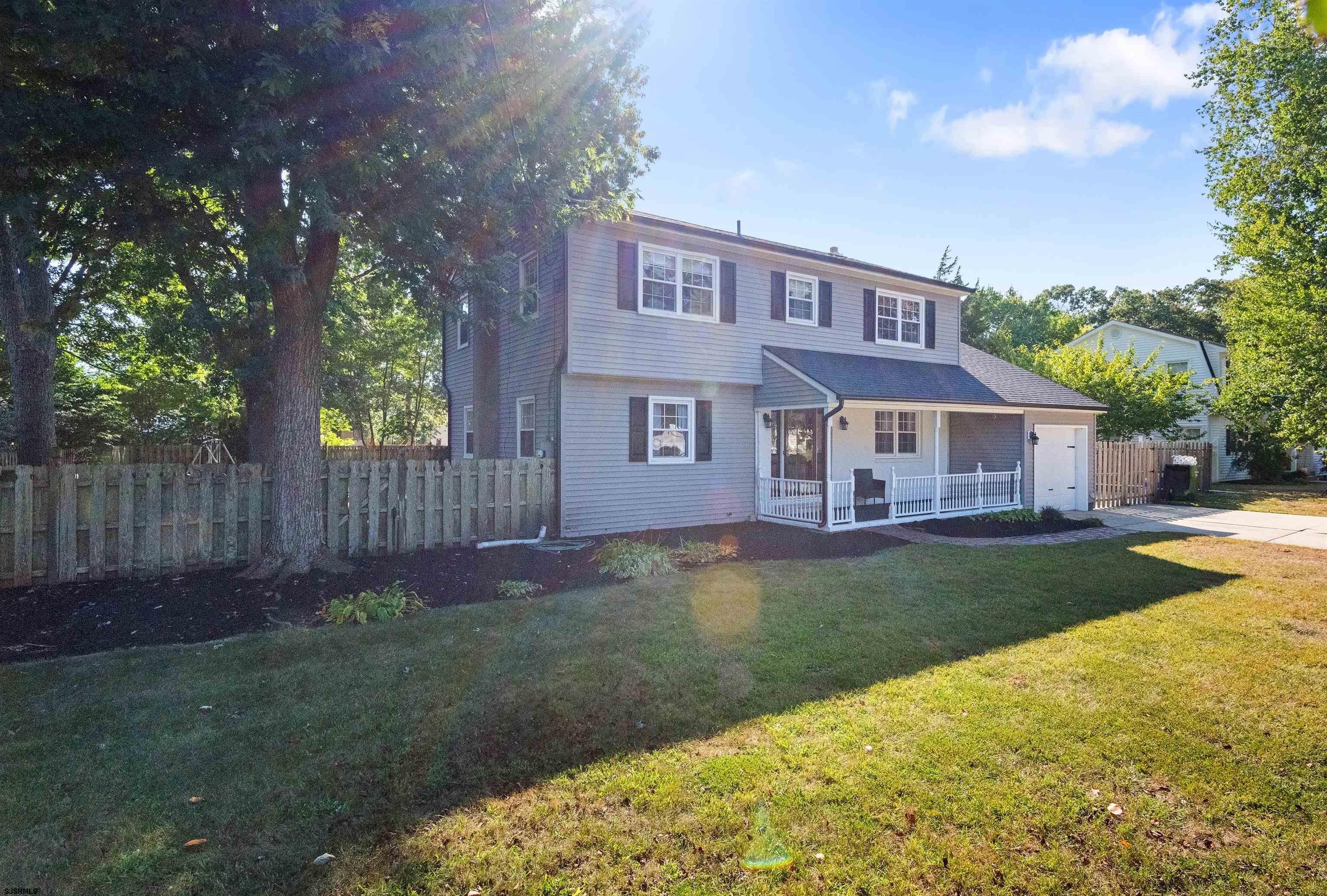 a view of a yard in front of house