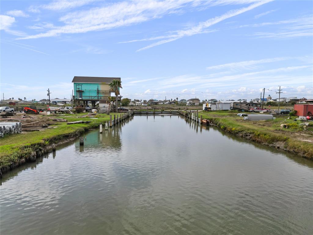 a view of a lake with a city