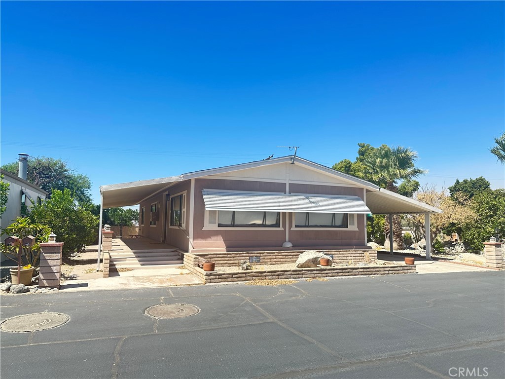 a front view of a building with street view