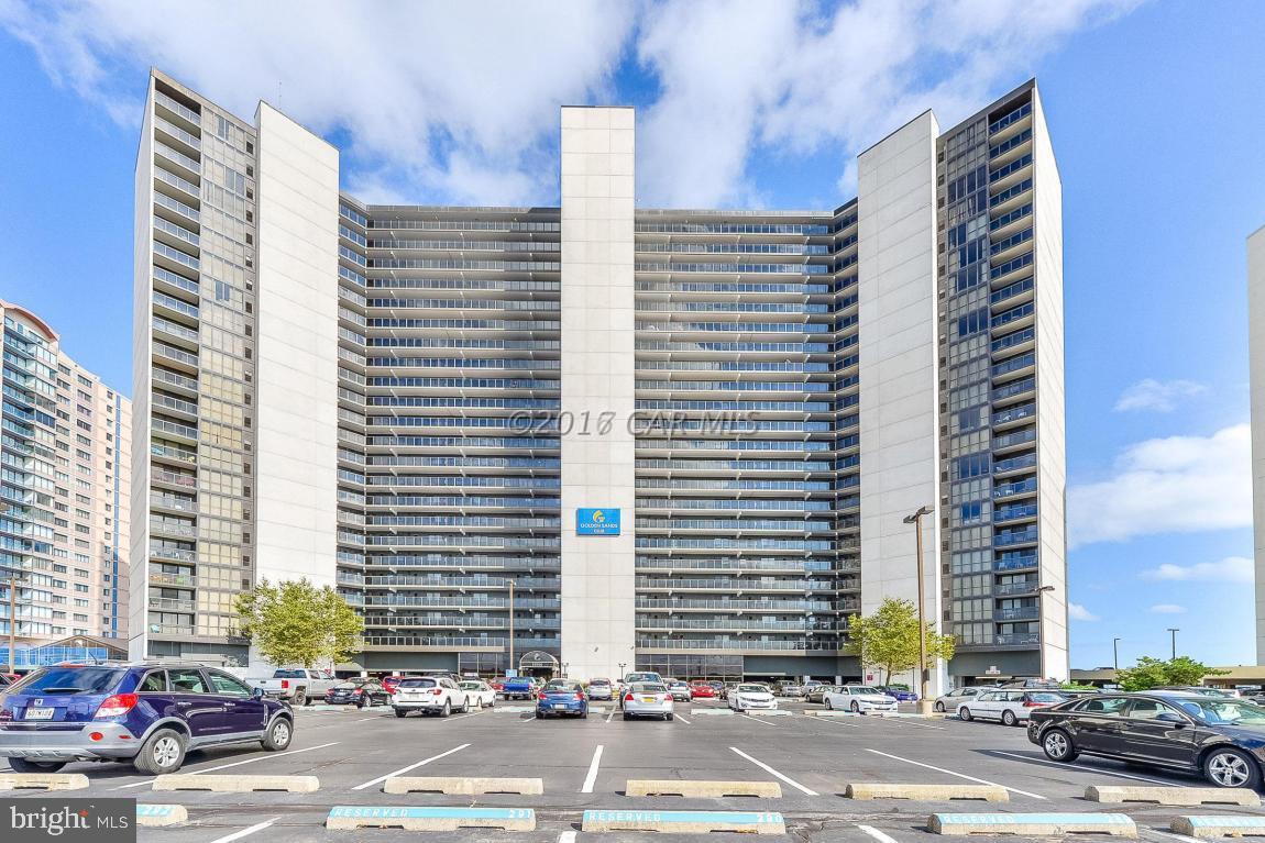 a front view of a building with street view