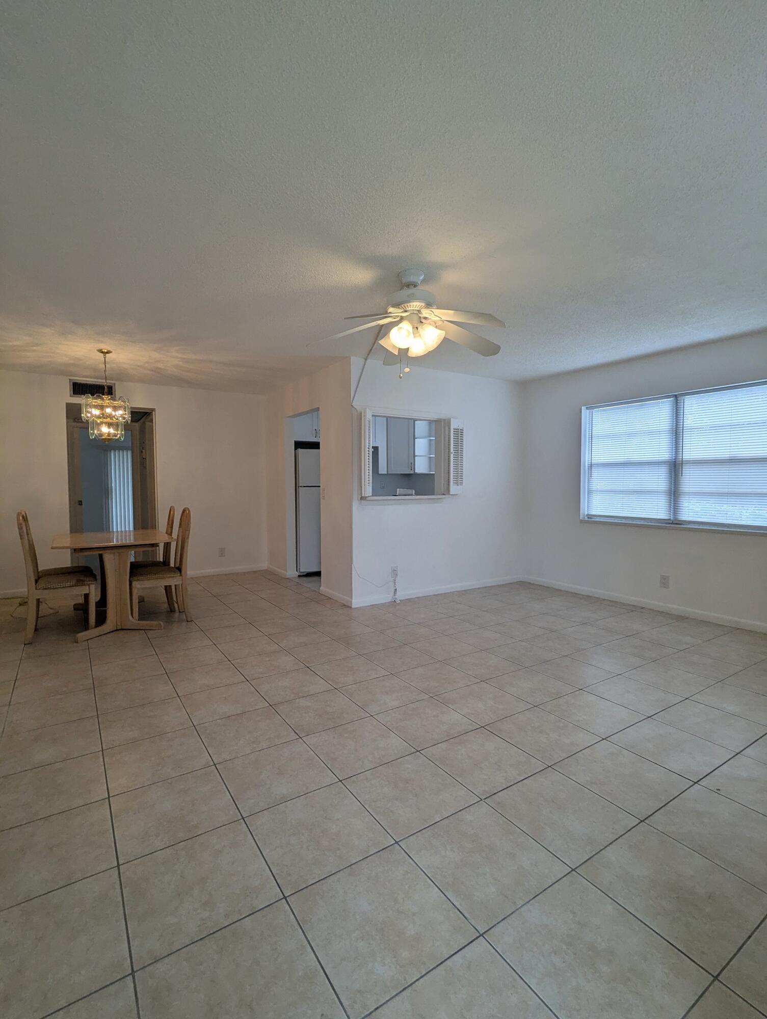 a view of a livingroom and a window