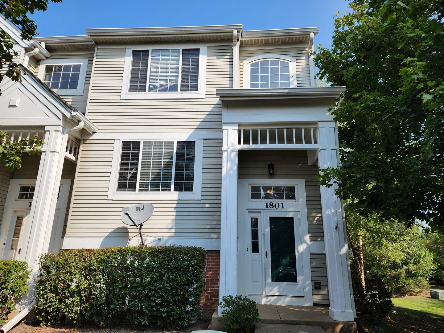 a front view of a house with a balcony