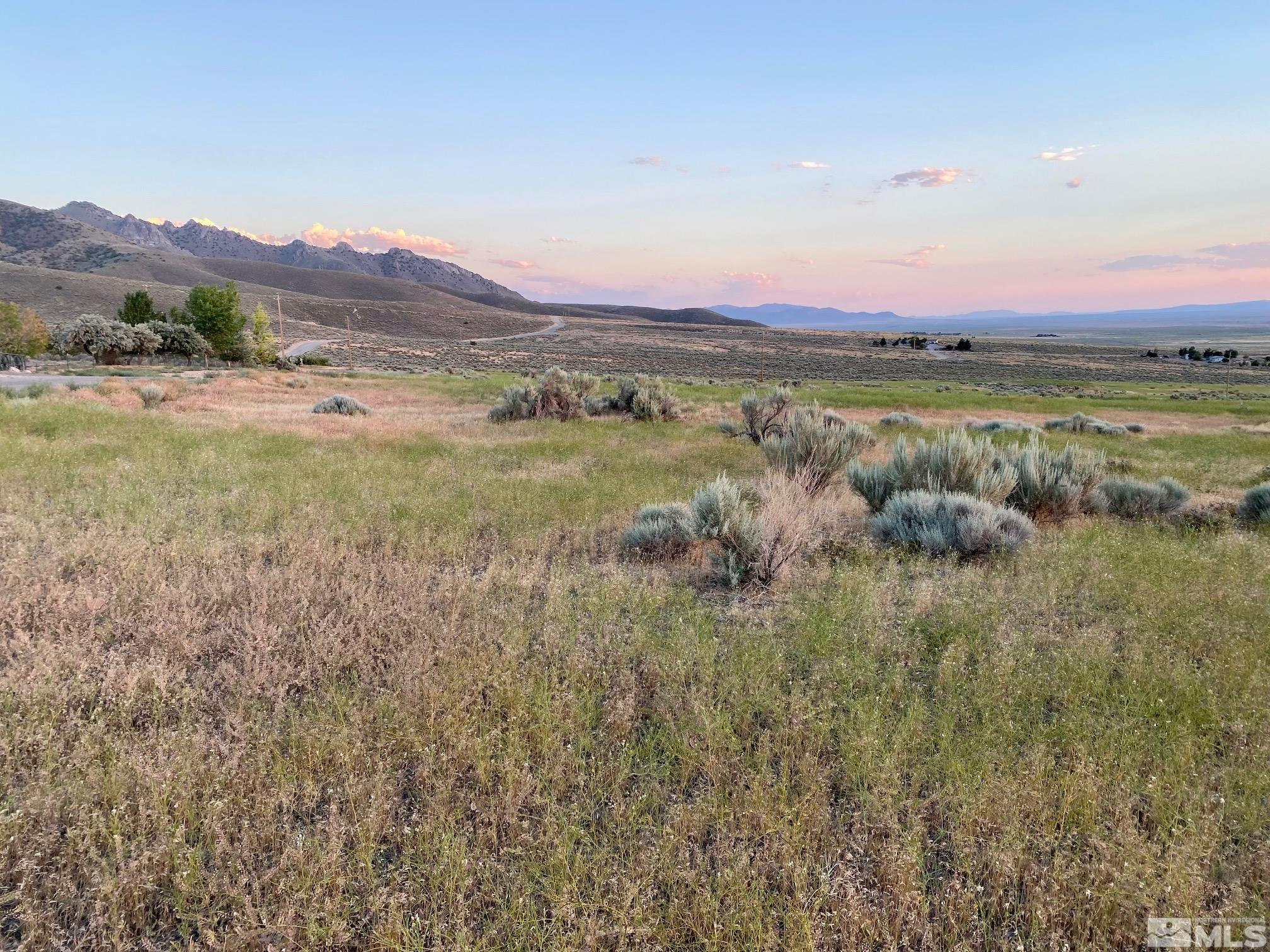 a view of an outdoor space and mountains