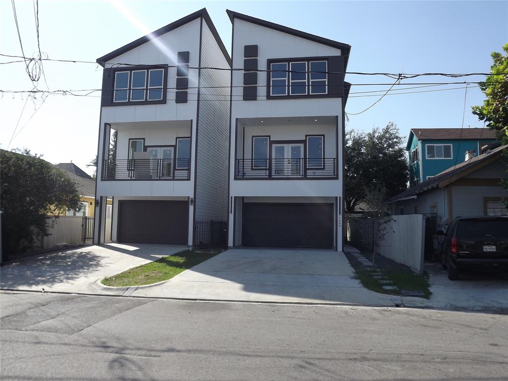 a front view of a house with yard