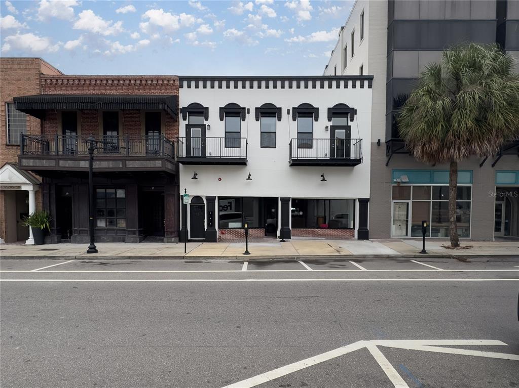 a view of a building with a street