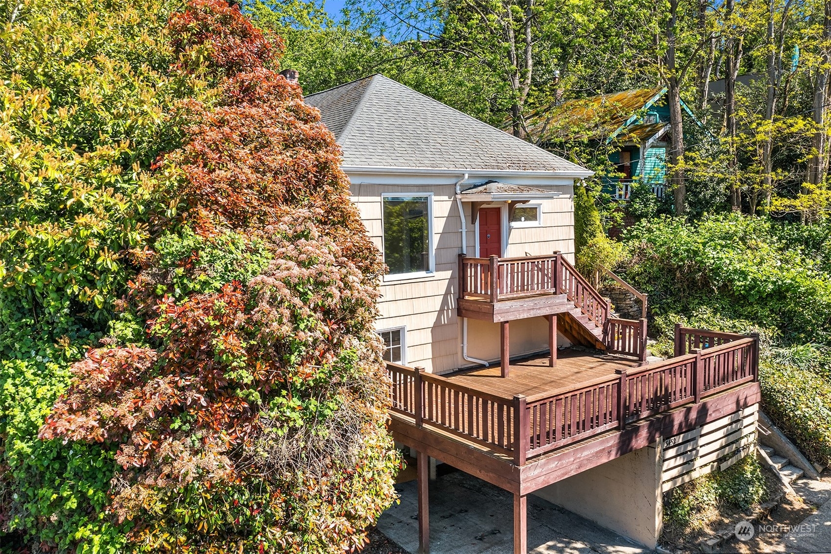 front view of a house with a chairs