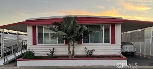 a view of house with a outdoor space