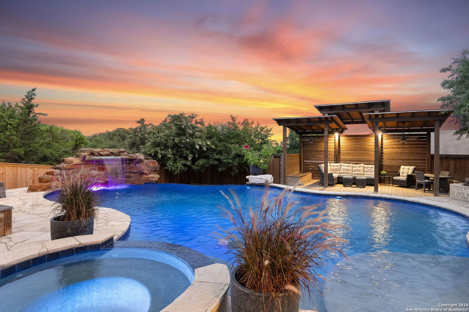 a view of a swimming pool with a lounge chair