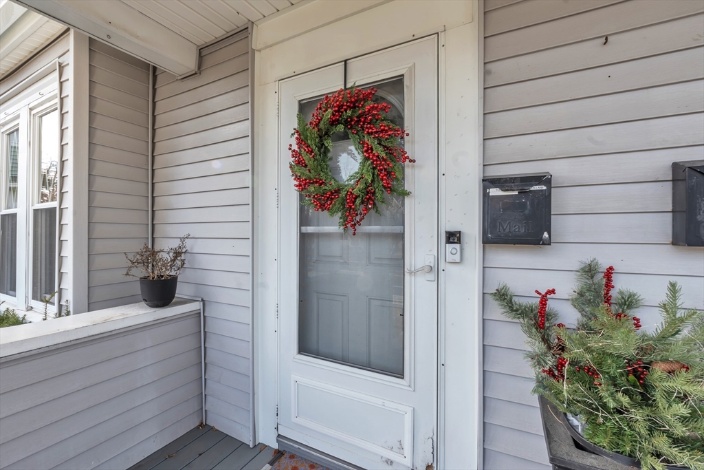 a view of front door and bedroom