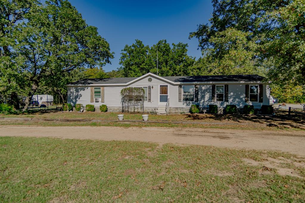 a view of a yard in front of house