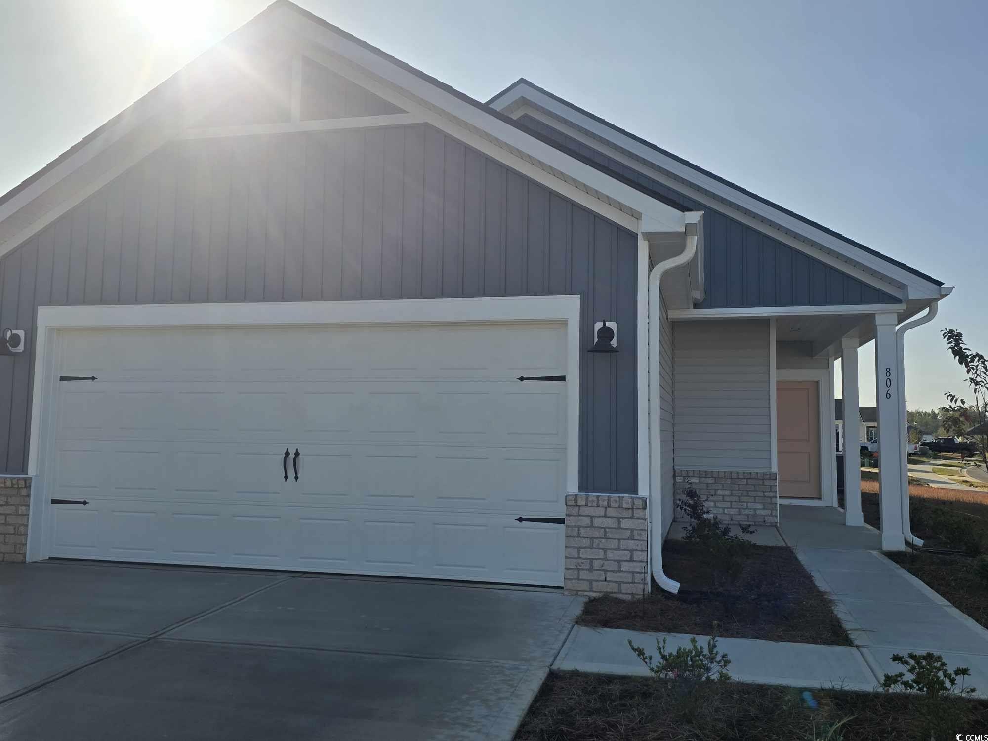 View of front of home featuring a garage