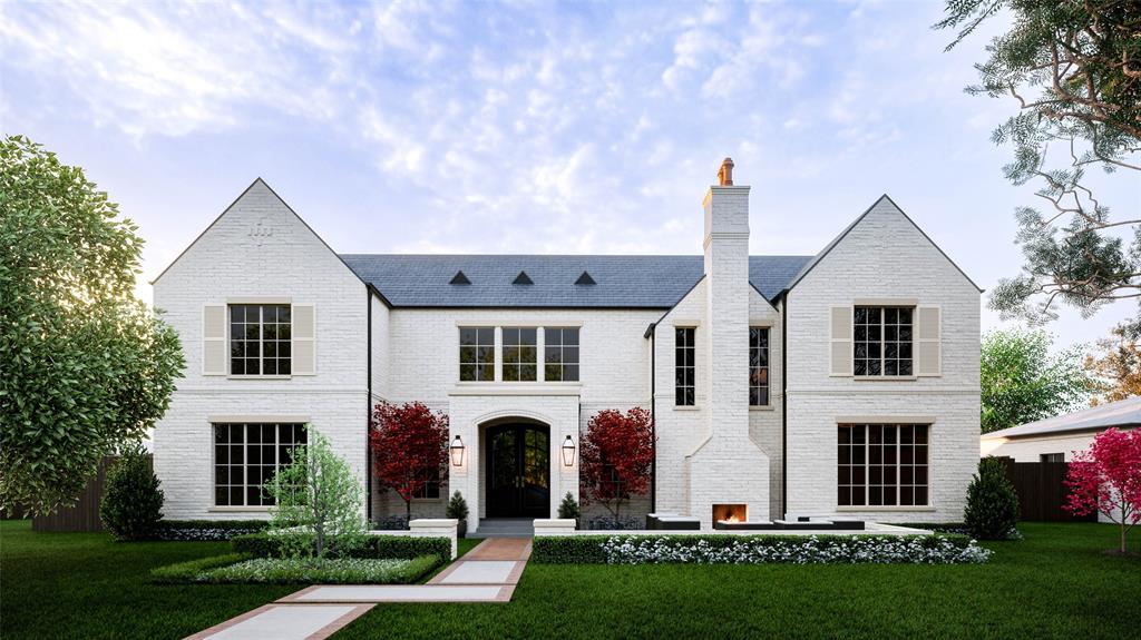 a front view of house with yard and green space