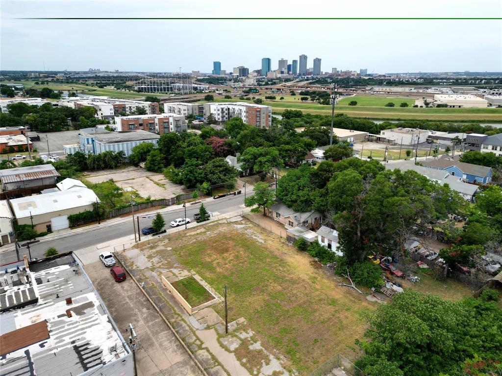 an aerial view of a city with lots of residential buildings