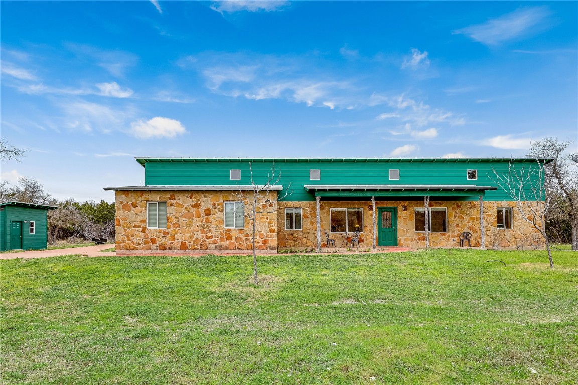 a view of a house with a big yard