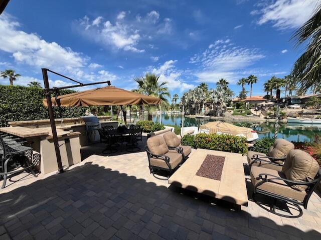 a view of a patio with swimming pool