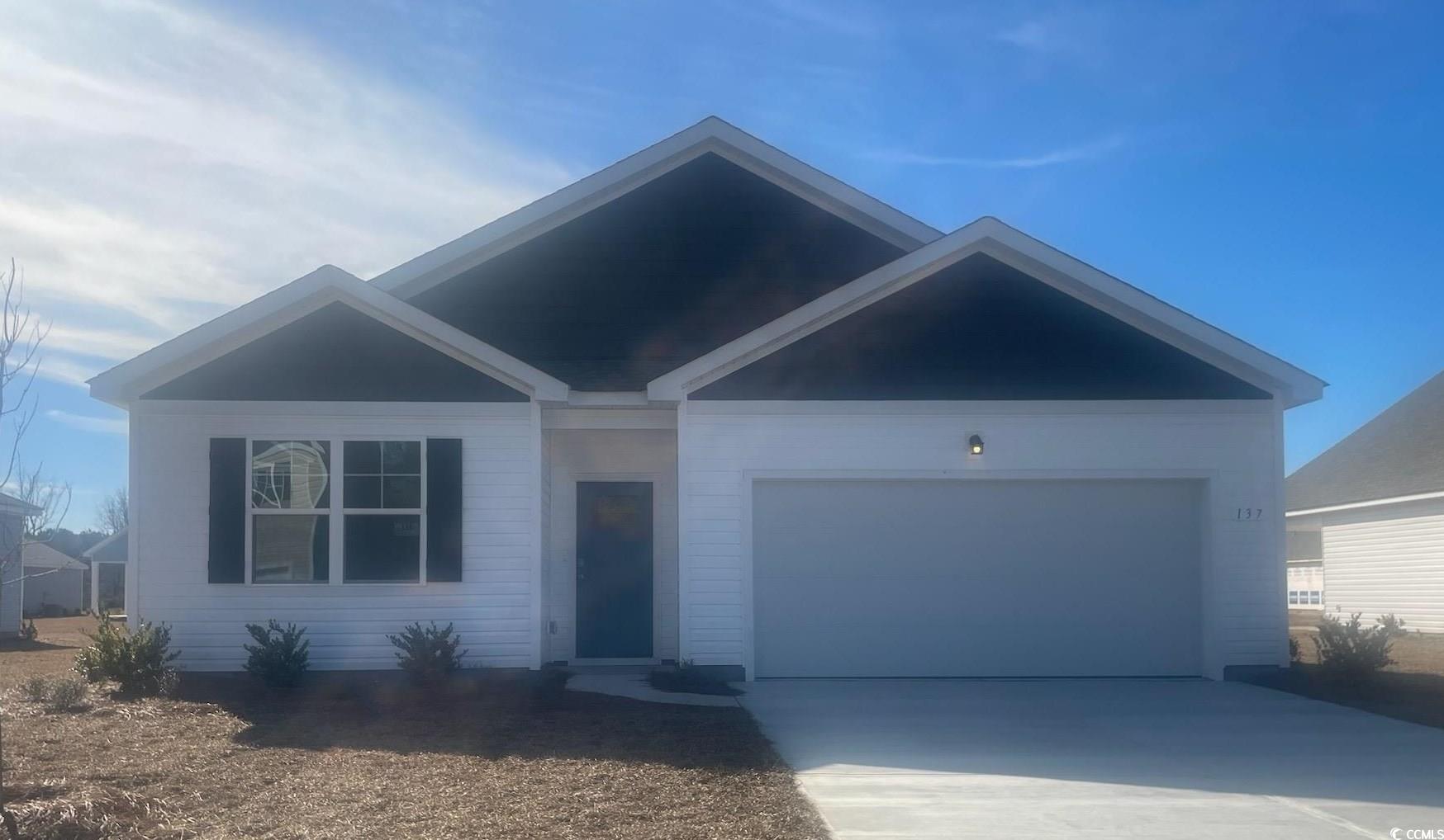 Lot 116 - View of front facade featuring a garage