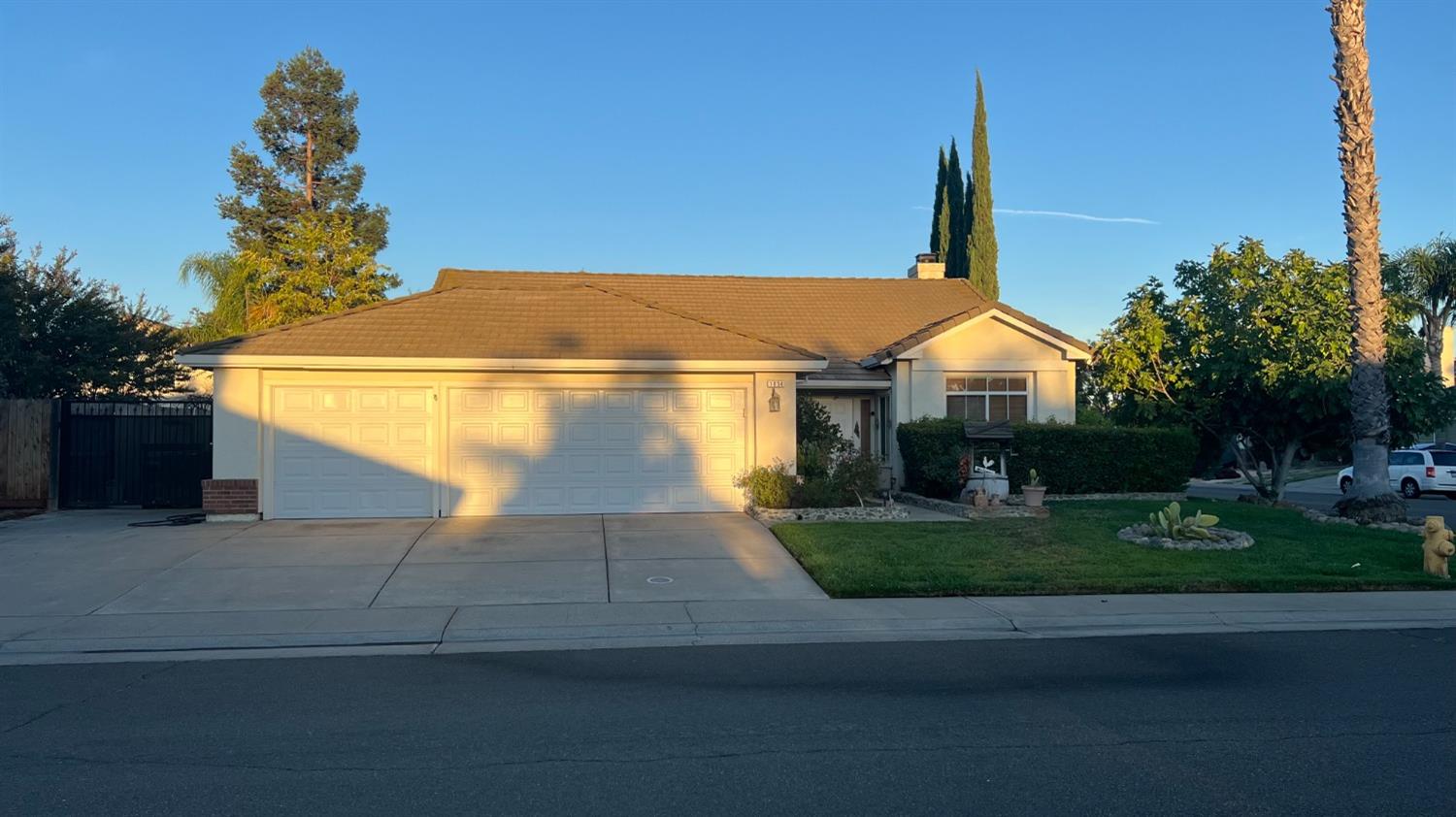 a front view of a house with yard