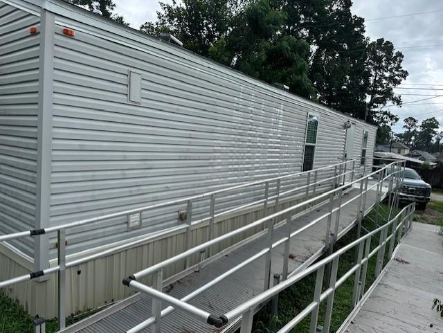 a view of a balcony with car parked