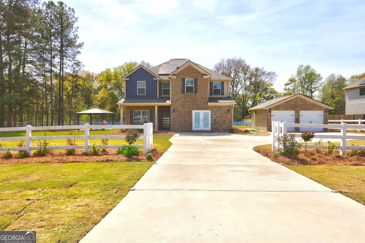 a view of a house with a swimming pool