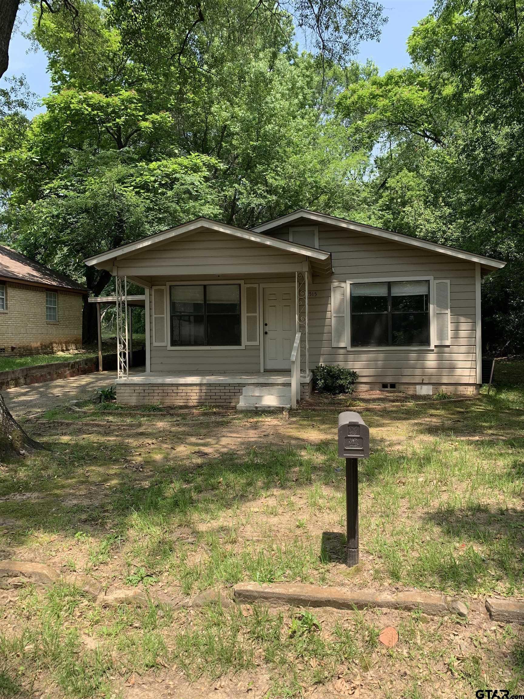 a front view of house with yard