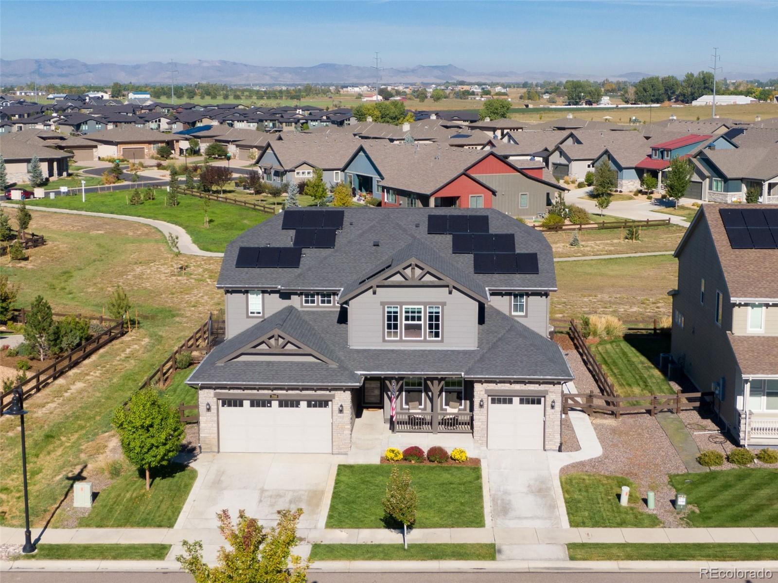 an aerial view of a house with a garden