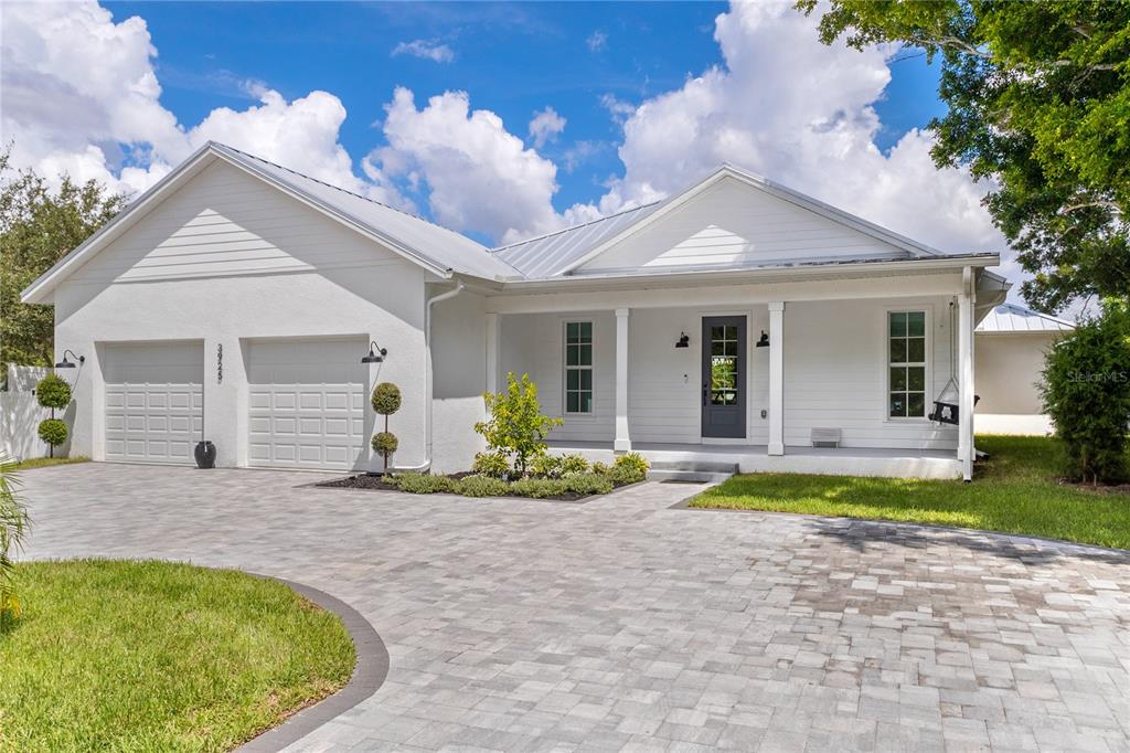 FRONT WITH CIRCULAR DRIVEWAY