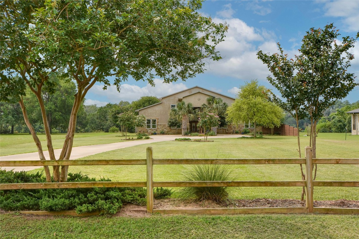 a view of a yard with an outdoor space