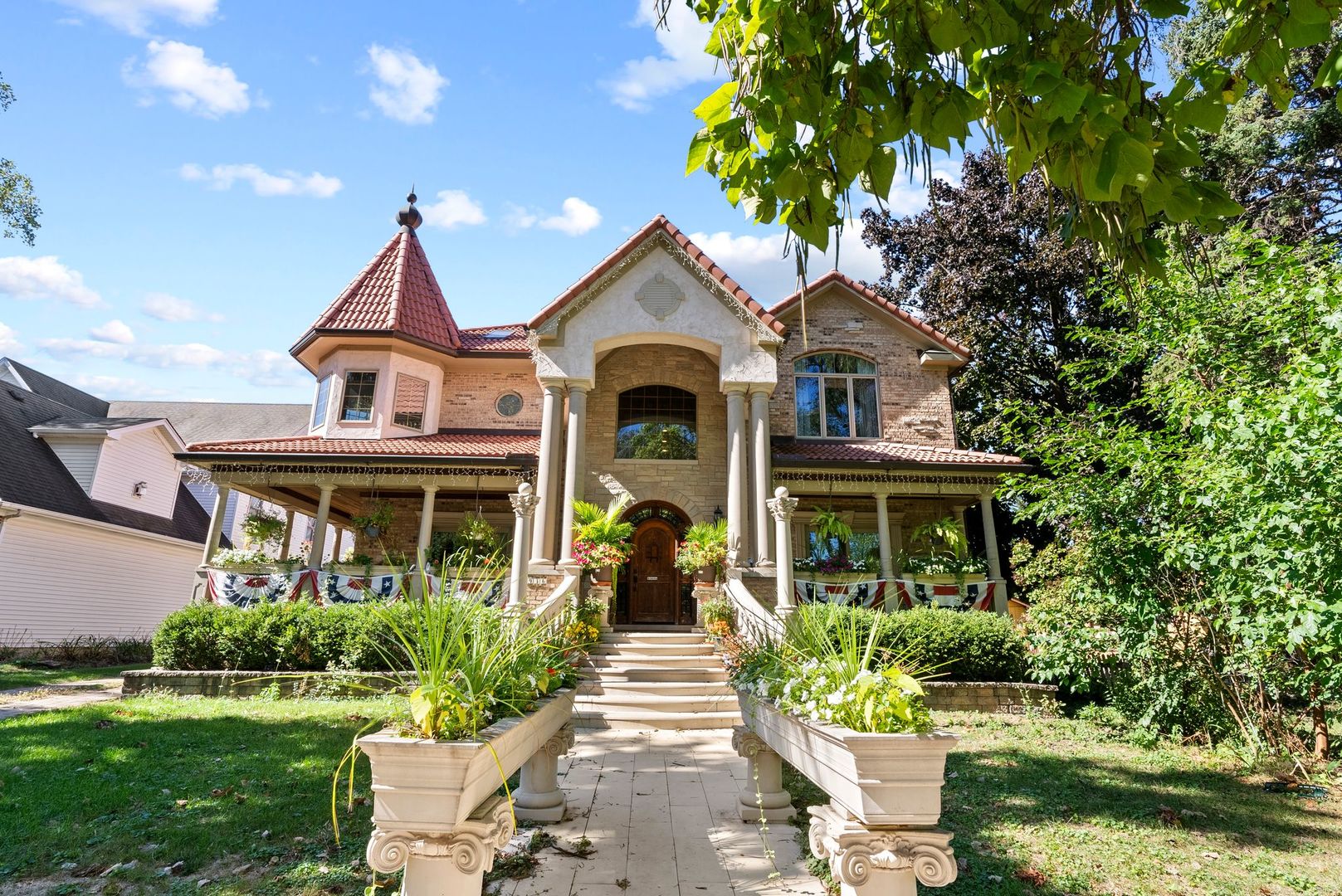 a front view of a house with a yard