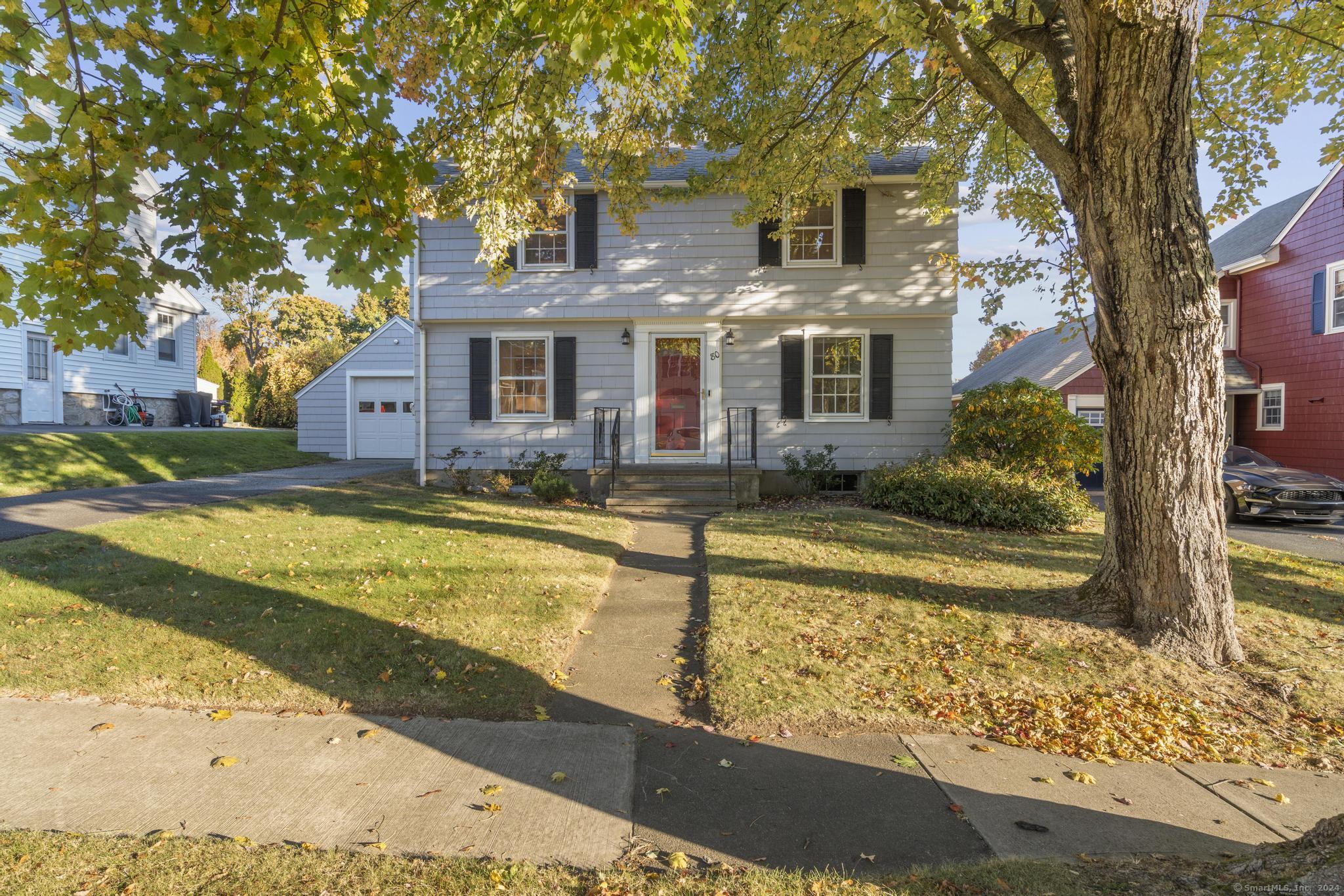 a front view of house with yard