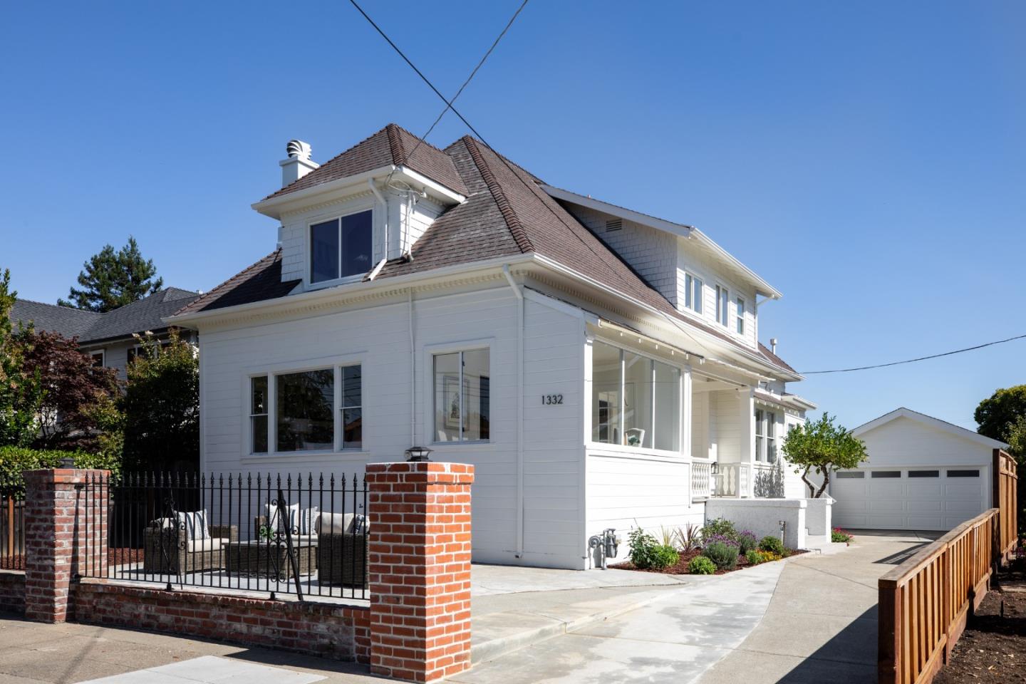 a view of a house with a street