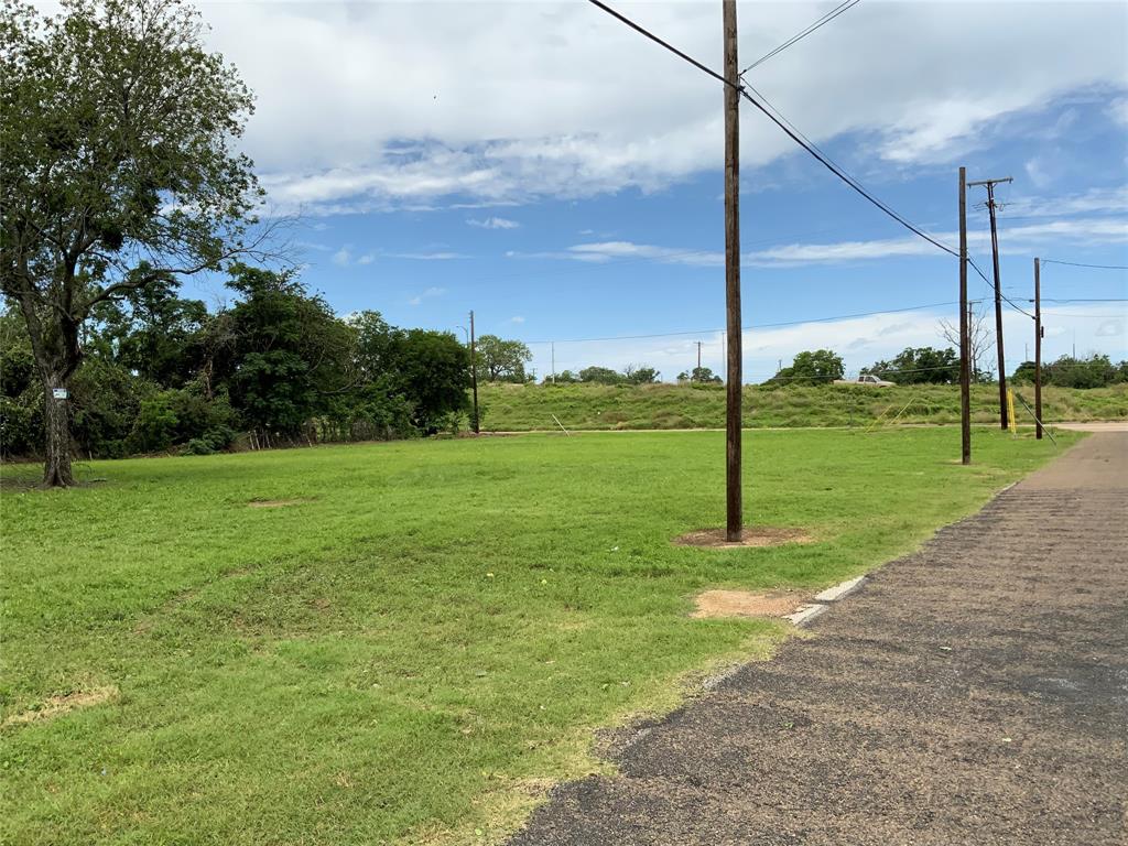 a view of a park with big yard