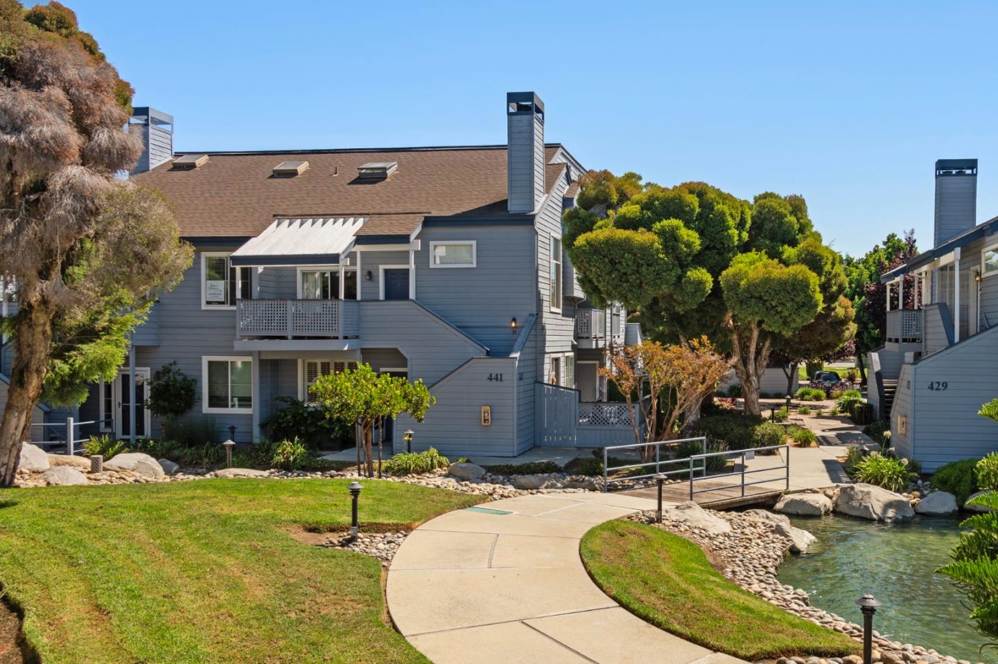 a view of a house with swimming pool