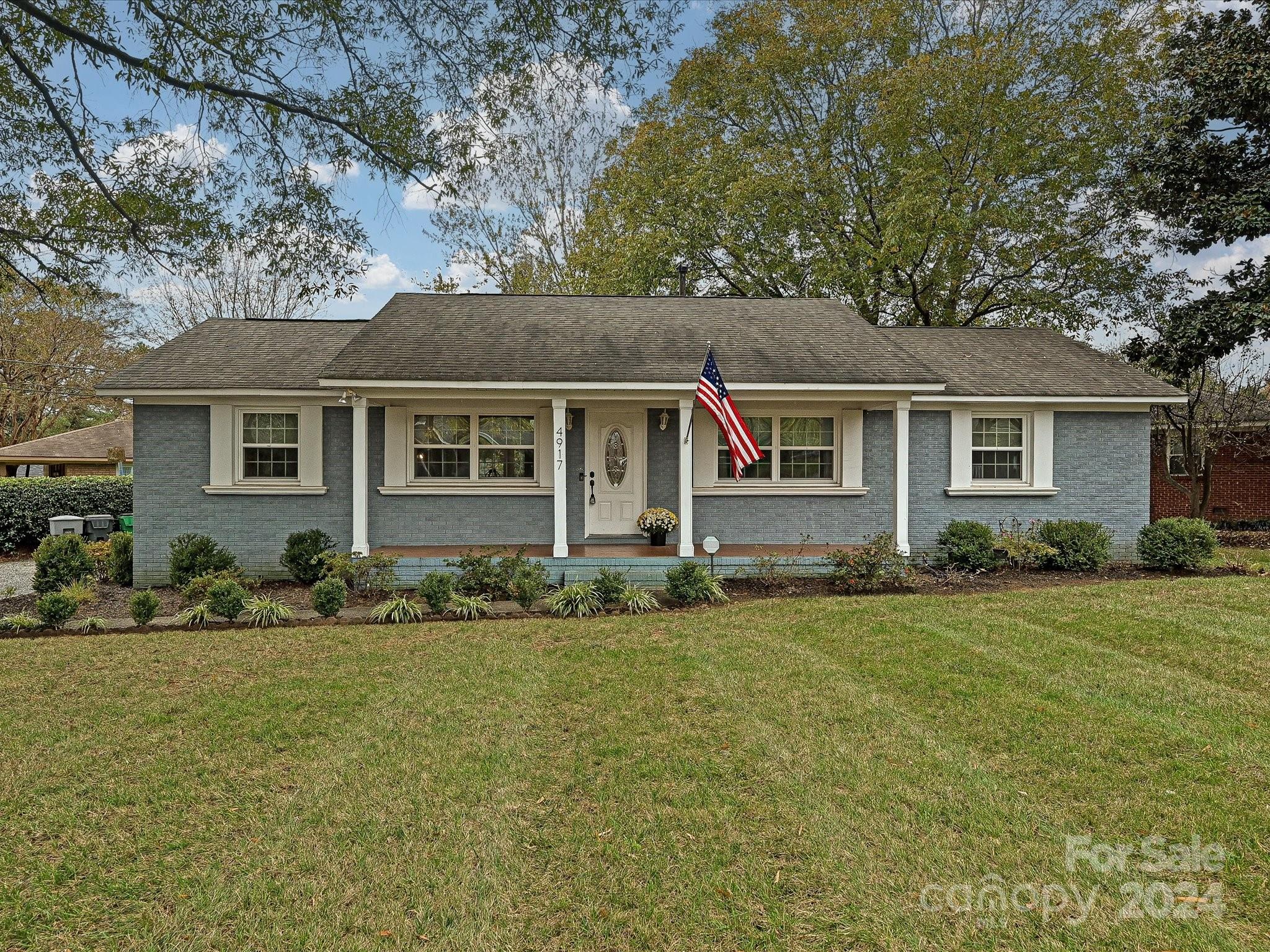 front view of a house with a yard