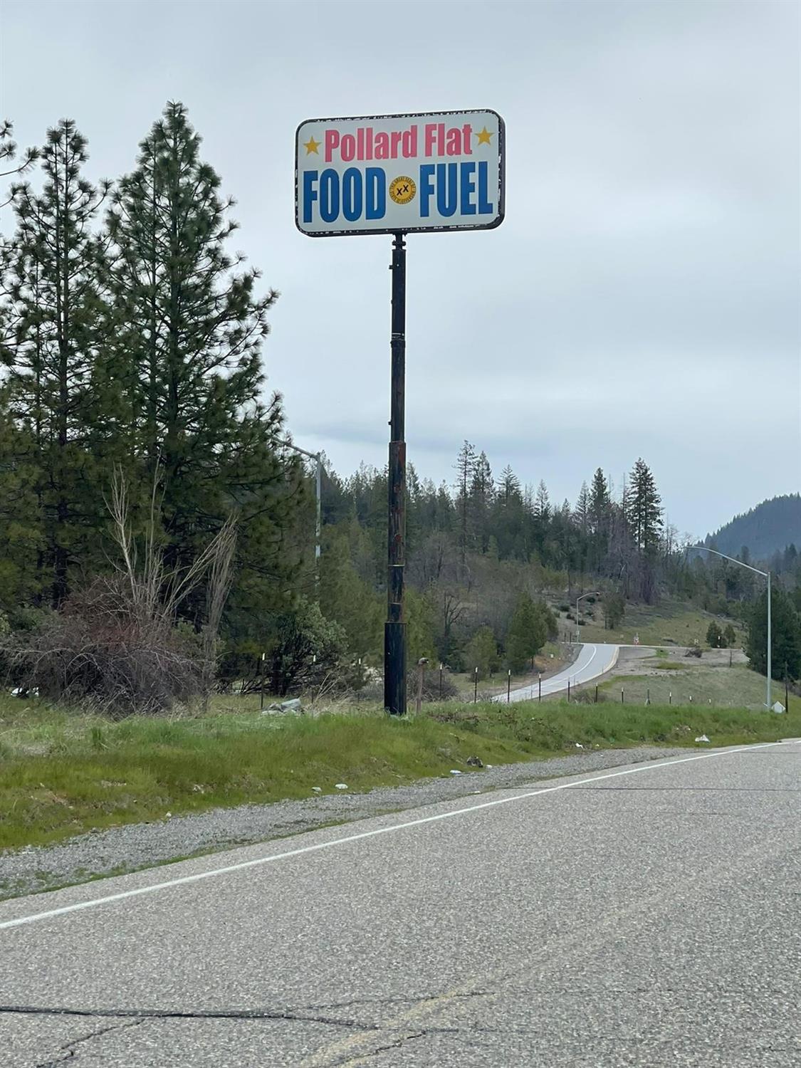 a street sign on a side of a road