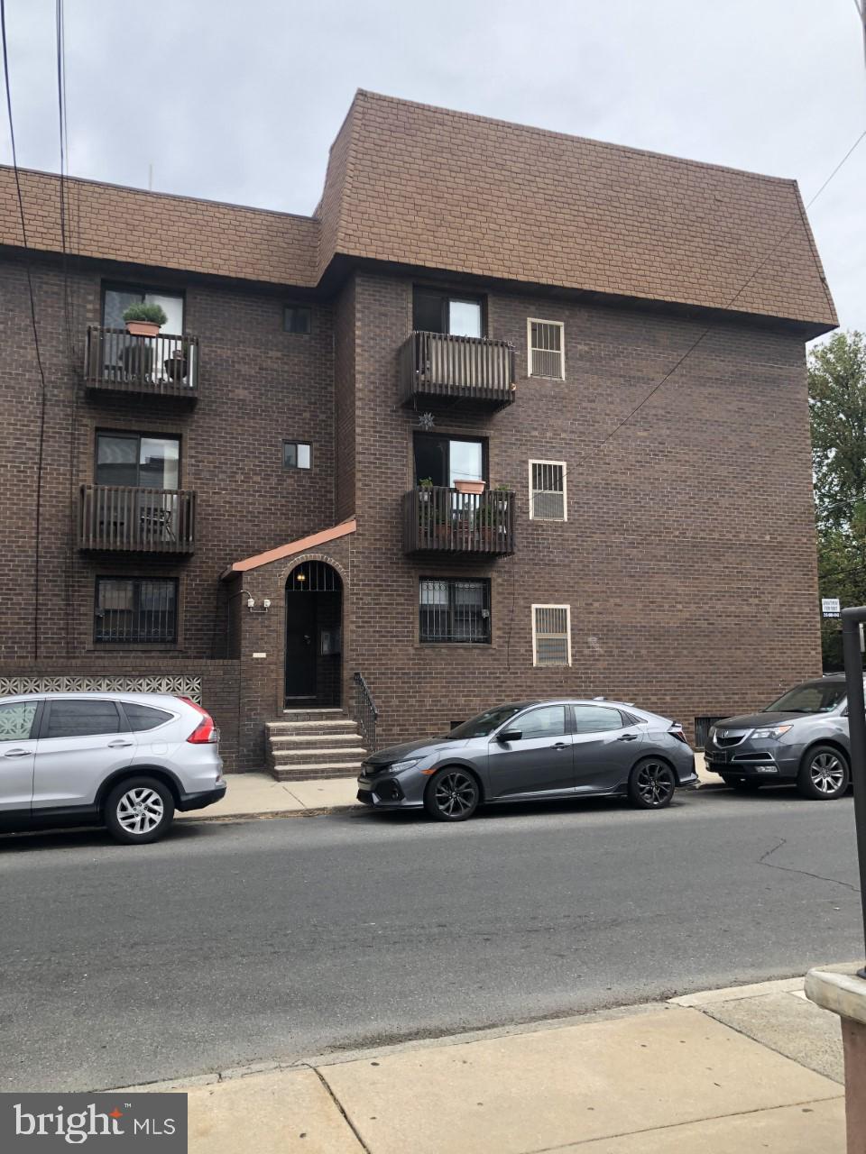 a front view of a house with parking