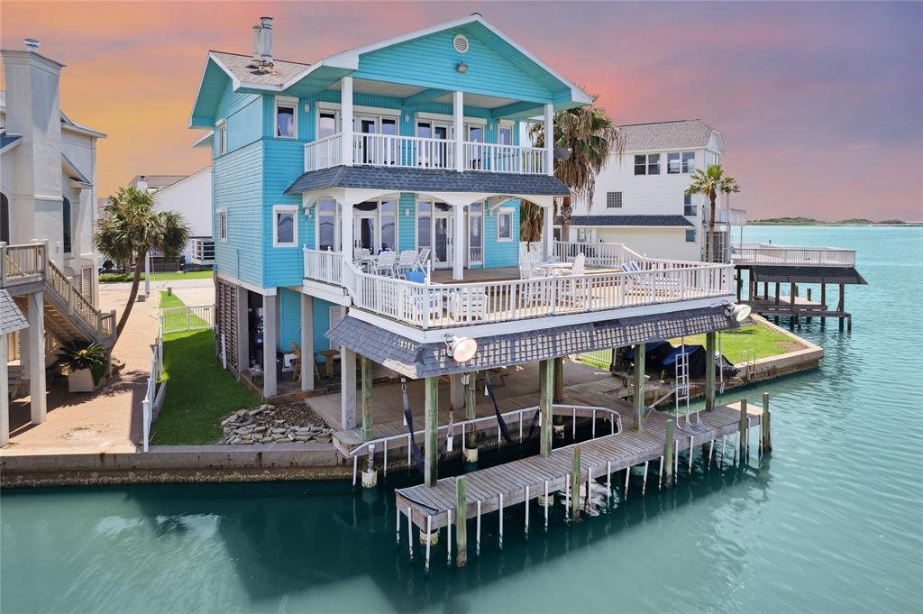 a view of a swimming pool with a deck