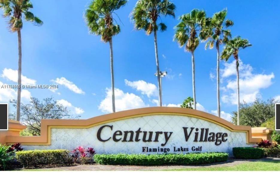 a view of a sign in front of house