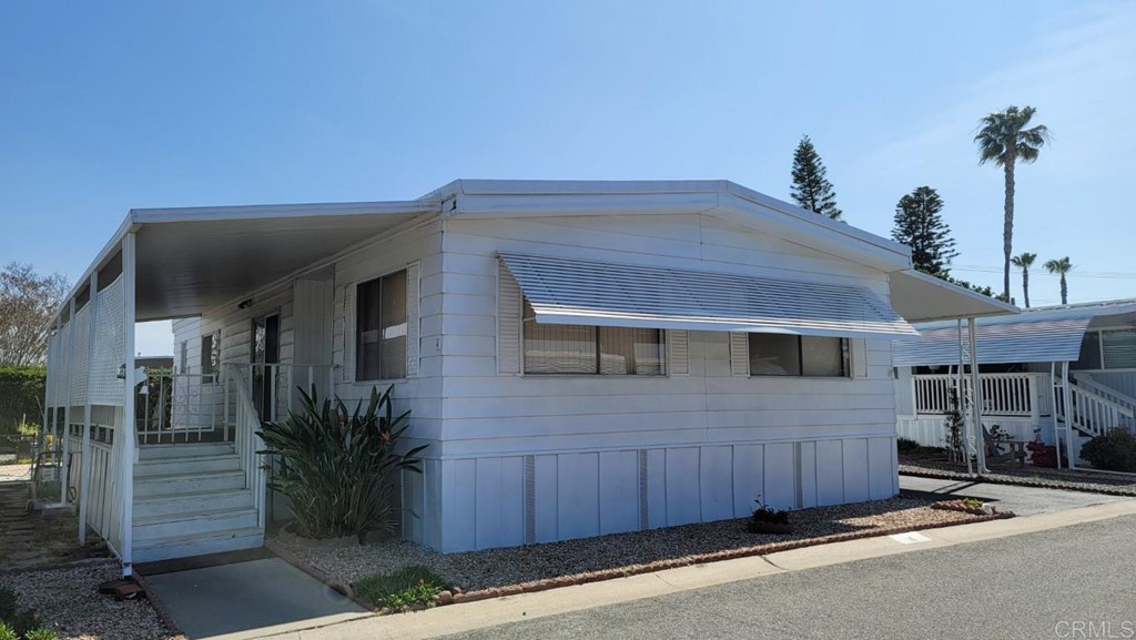 a view of a house with a garage