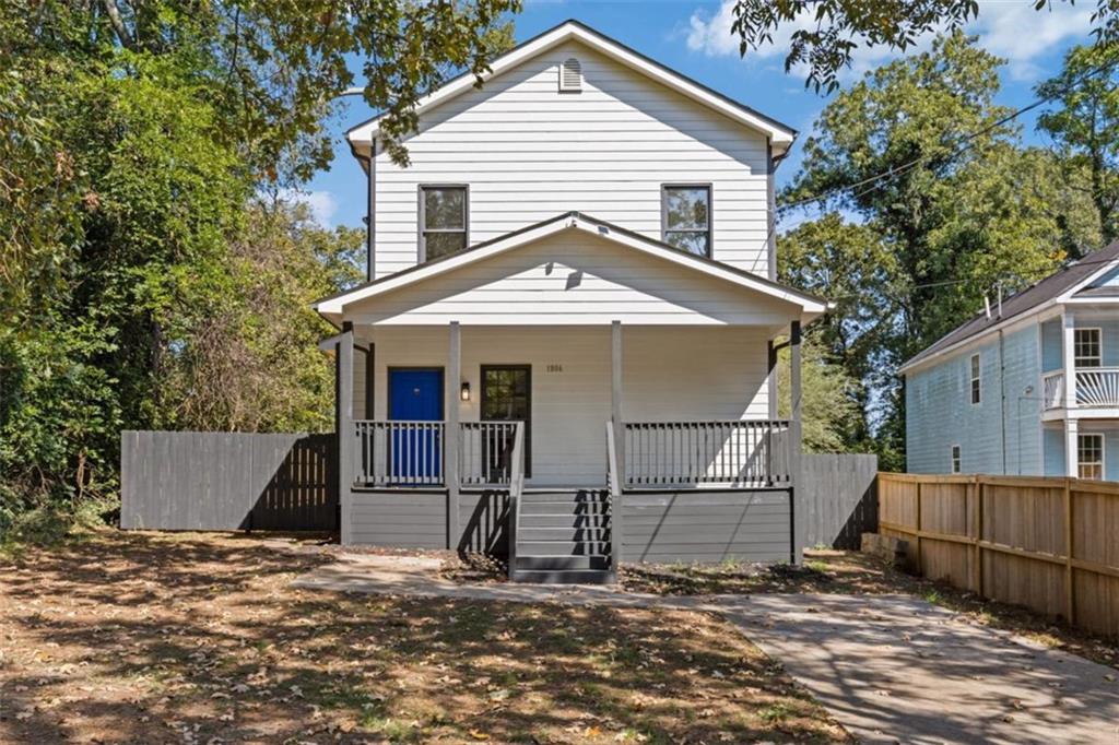 a front view of a house with a garage